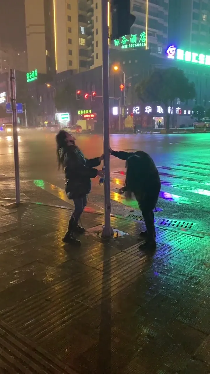 Girl doing something hilariously illogical and confusing after a few drinks